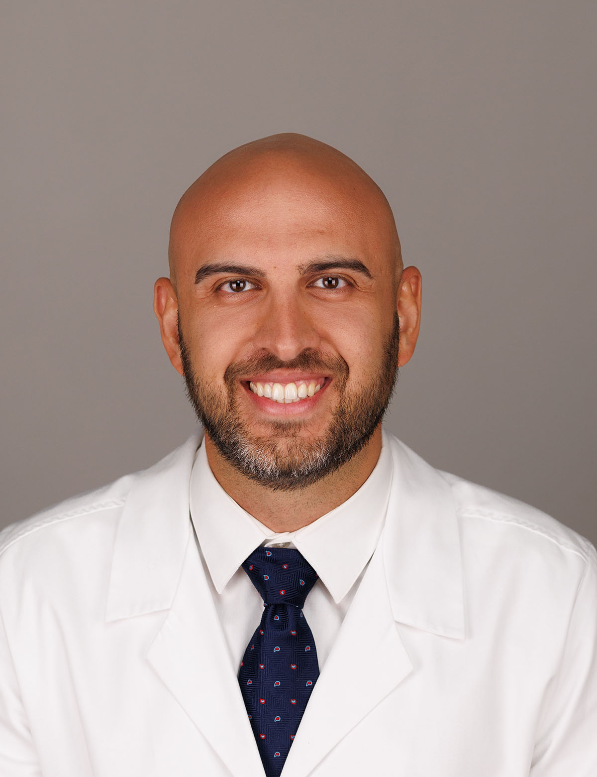 Tuna Ustunkaya, MD